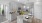 a kitchen with white cabinets