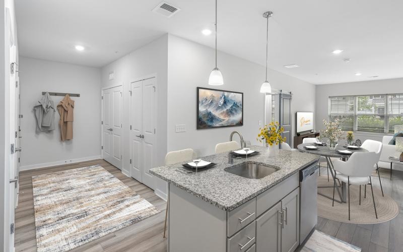 a kitchen with a rug